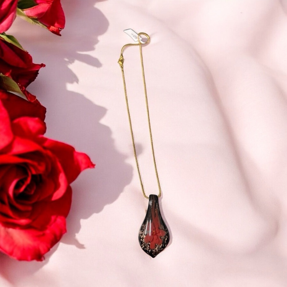 Elegant Teardrop Pendant withRed Floral Accents